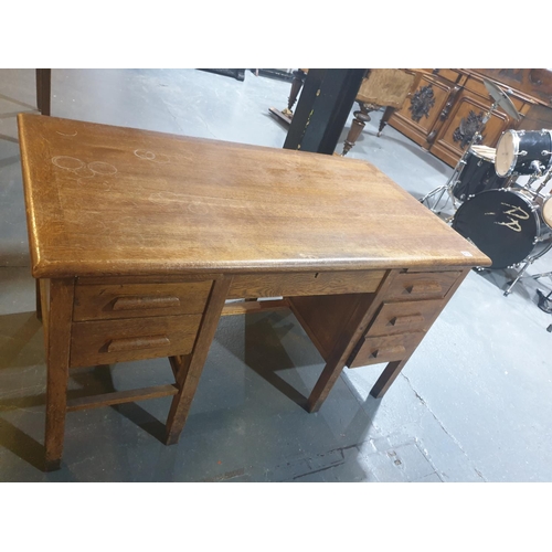 215 - An oak pedestal desk (missing drawer)