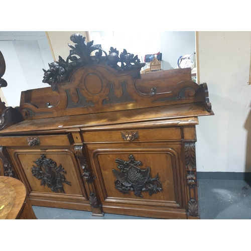 236 - A very large dresser with carved panels and supports (back mirror and frame missing)