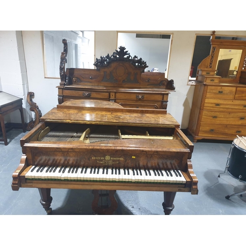 239 - A walnut Gustav Hagspeil baby grand piano