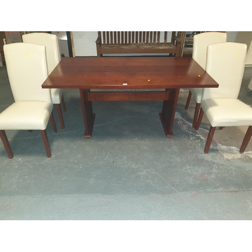 831 - A dining table and four chairs