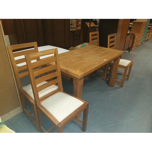 854 - Oak dining table and four chairs