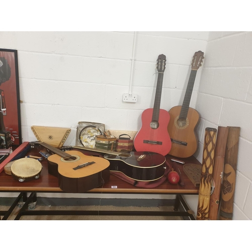 24 - Four acoustic guitars (Mohner etc) and other musical instruments