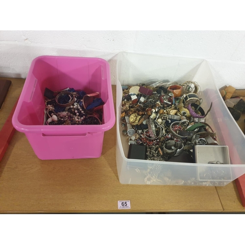 65 - A large quantity of costume jewellery and watches