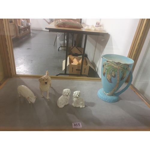 465 - A Beswick dog, pig, pair of dogs and a large palm tree jug