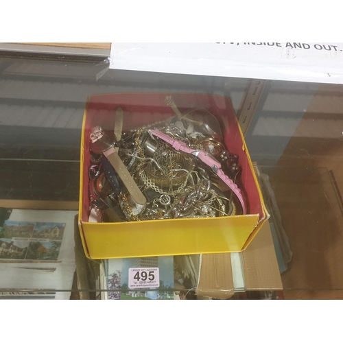 495 - A quantity of costume jewellery and watches