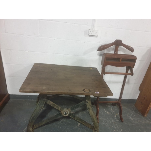 201 - A reclaimed timber table on cast iron base and a valet stand