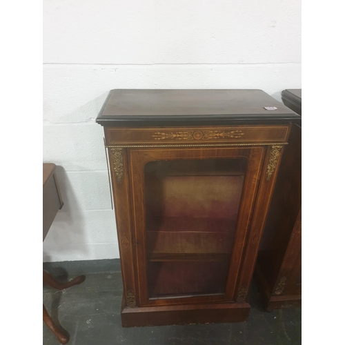 204 - A Victorian mahogany and rosewood pier cabinet with ormolu mounts