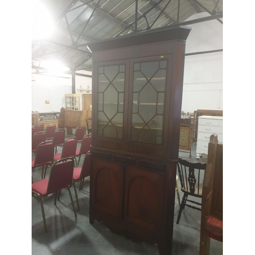 207 - A large mahogany corner cabinet