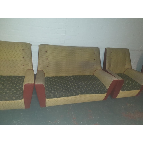 768 - A retro style two seater sofa with two matching armchairs