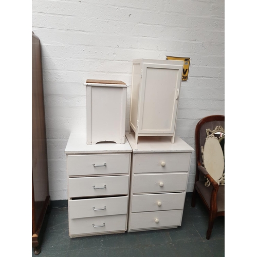 311 - Two white chests of drawers, bedside cabinet and a pot cabinet