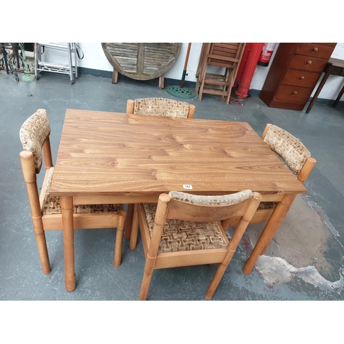 342 - A dining table and four chairs