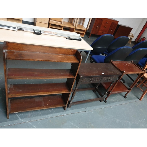 353 - A bookcase, drinks trolley and a hall table