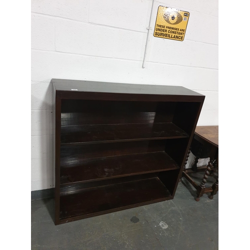 105 - A dark mahogany bookcase