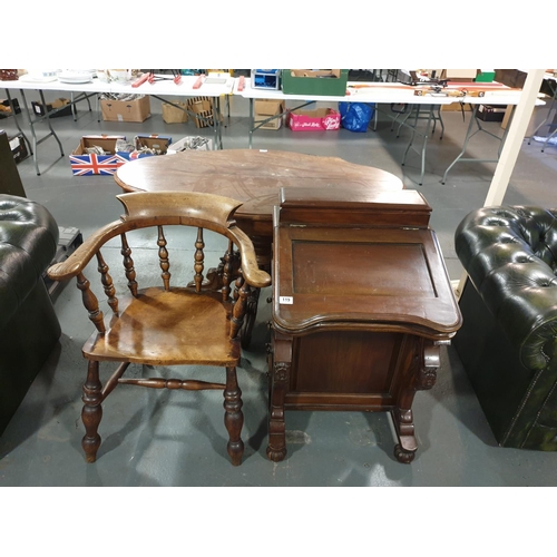 119 - A mahogany davenport and a smokers bow chair