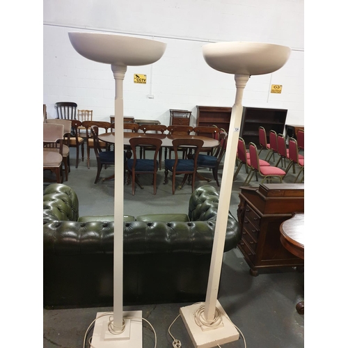 124 - A pair of cream standard lamp uplighters