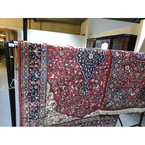 140 - Two hand woven Persian rugs (one moth eaten)