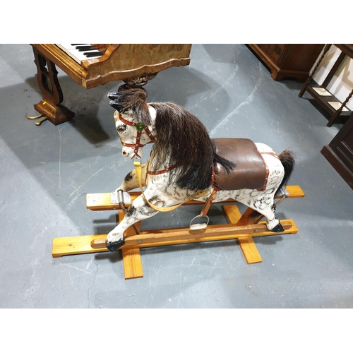 143 - An early rocking horse in excellent condition