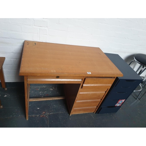 518 - A wooden desk and an office cabinet