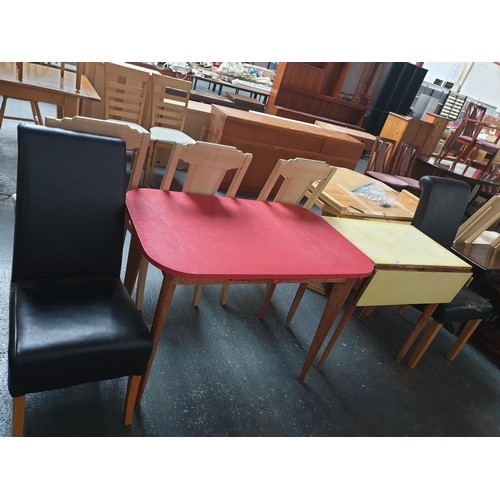 524 - Two melamine topped vintage tables and two chairs