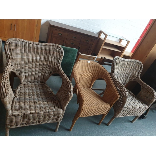 541 - Three wicker chairs