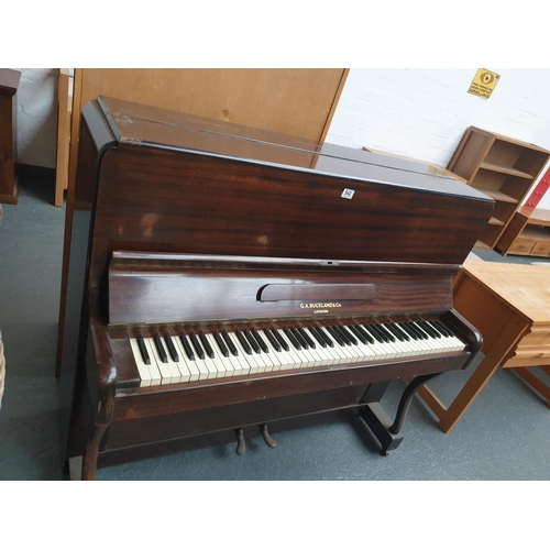 542 - A G.A. Buckland upright piano