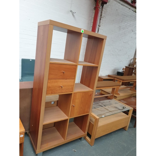 545 - An oak cabinet with glass top and a modern wall unit