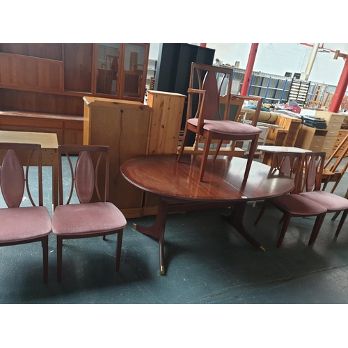 554 - A mahogany G Plan extending dining table with five chairs