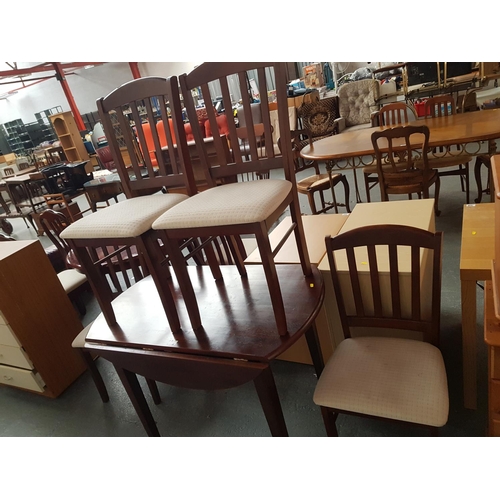 333 - A drop leaf dining table and four chairs