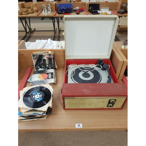 40 - A Fidelity portable record player and a selection of 45 records