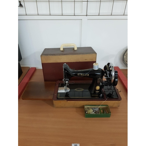 50 - A 99K hand crank Singer sewing machine