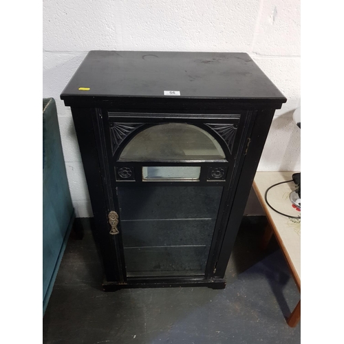 56 - An ebonised 1920's cabinet