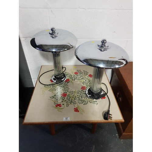 57 - A retro side table and a pair of retro style lamps
