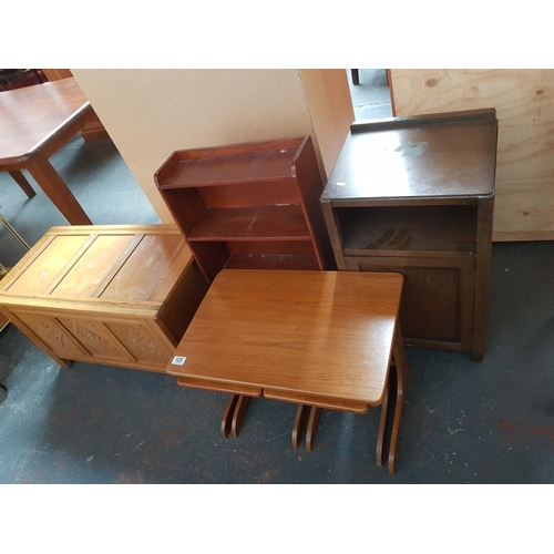 529 - A nest of tables, bookcase, blanket box etc