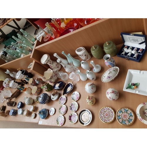 30 - A selection of mixed china and porcelain trinket boxes, perfume bottles, vases, crystal etc
