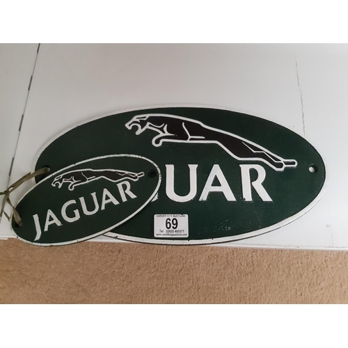 69 - 2 cast iron Jaguar signs