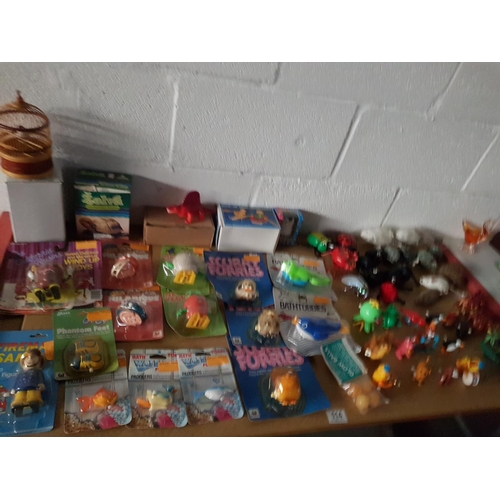 114 - A collection of wind up toys , some in blister packs including 1940's Schuco mechanical mouse etc