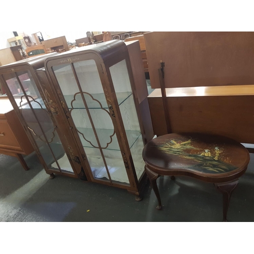 209 - A display cabinet and a small table