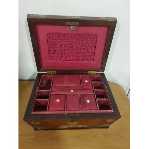 298 - A mother of pearl inlaid rosewood sewing box