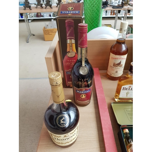 34 - Boxed Martell V.S.O.P. Medallion Old Fine Conac and a bottle of Hennessy Very Special Conac