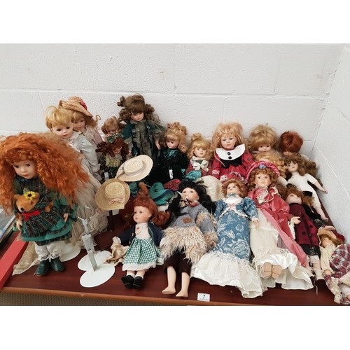7 - A quantity of porcelain collectable dolls