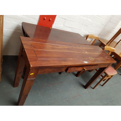 510 - An oak gate leg table and a desk
