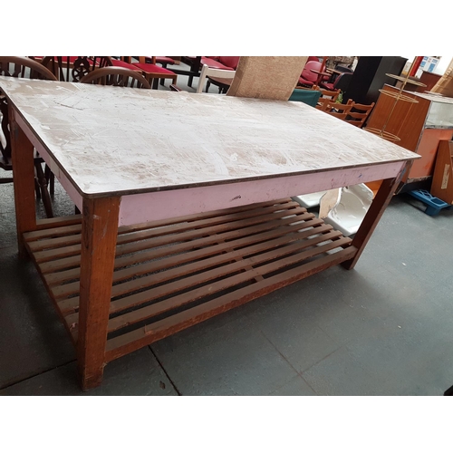 533 - A large Formica top work table