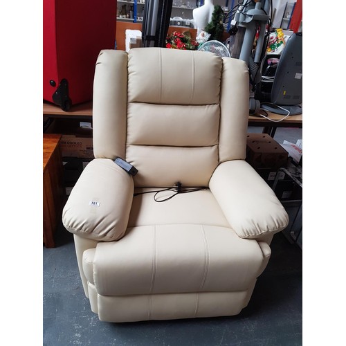 581 - An electric reclining chair in cream - like new