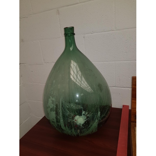 54 - A large glass Carboy