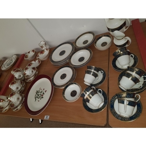 61 - Royal Albert 'Old Country Roses part dinner service and a Royal Doulton Carlyle part dinner service