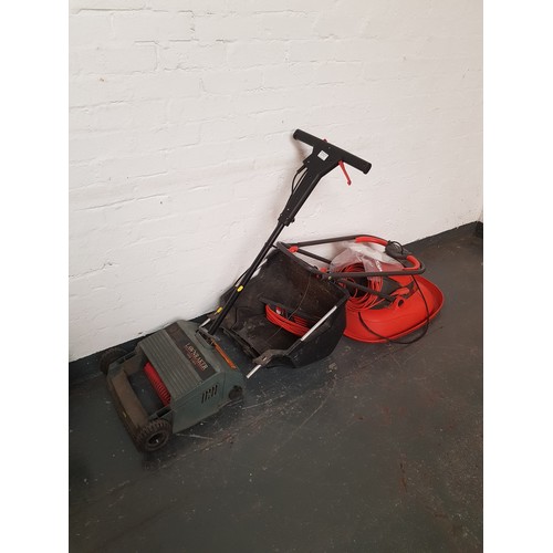 769A - A Flymo turbo lite 350 electric lawn mower and a Black and Decker Lawnraker GD200