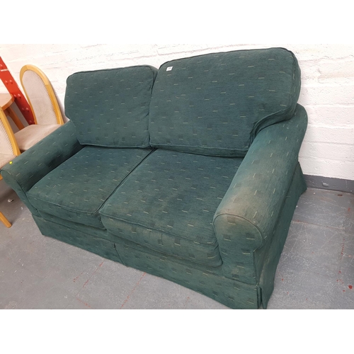 305 - A green fabric sofa bed - thick mattress