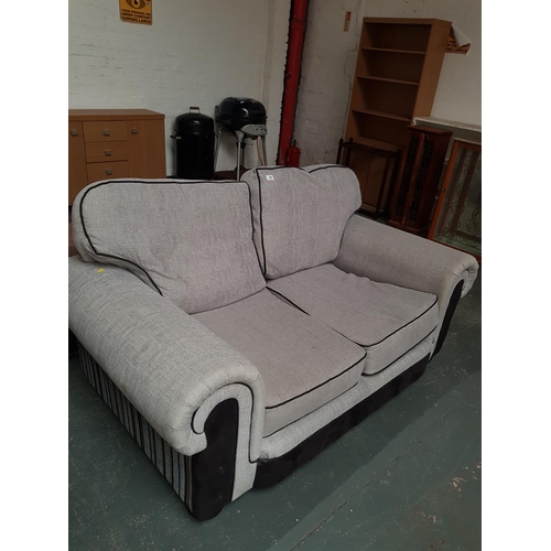 344 - A grey two seater sofa