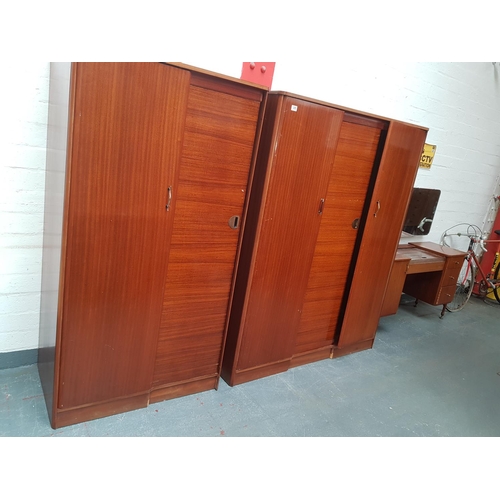 305 - Two teak Austin Suite wardrobes and a dressing table