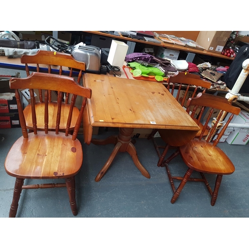 362 - A drop leaf dining table and four chairs